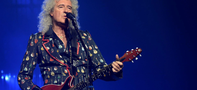 Guitarrista de Queen Brian May recibe título de caballero